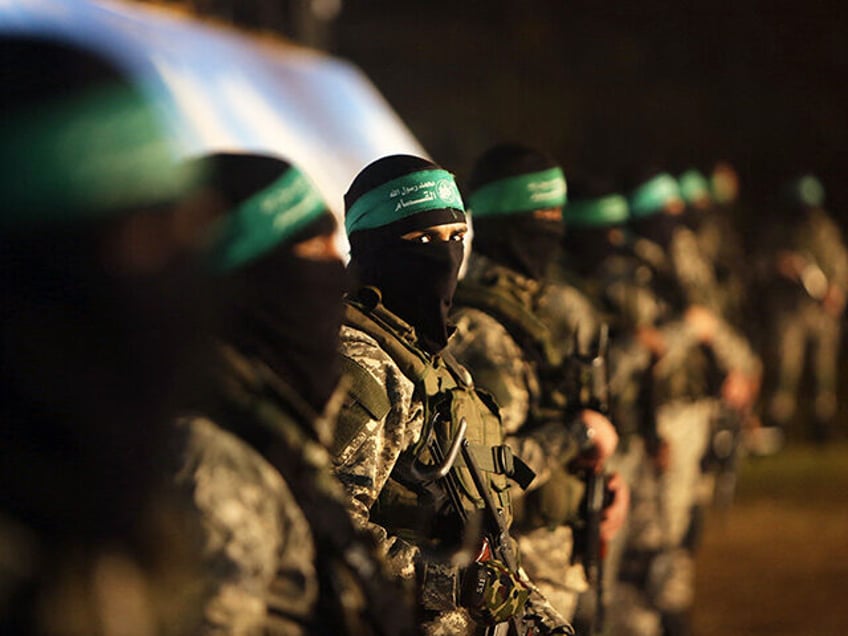 Palestinian members of the Ezzedine al-Qassam Brigades, the armed wing of the Hamas moveme