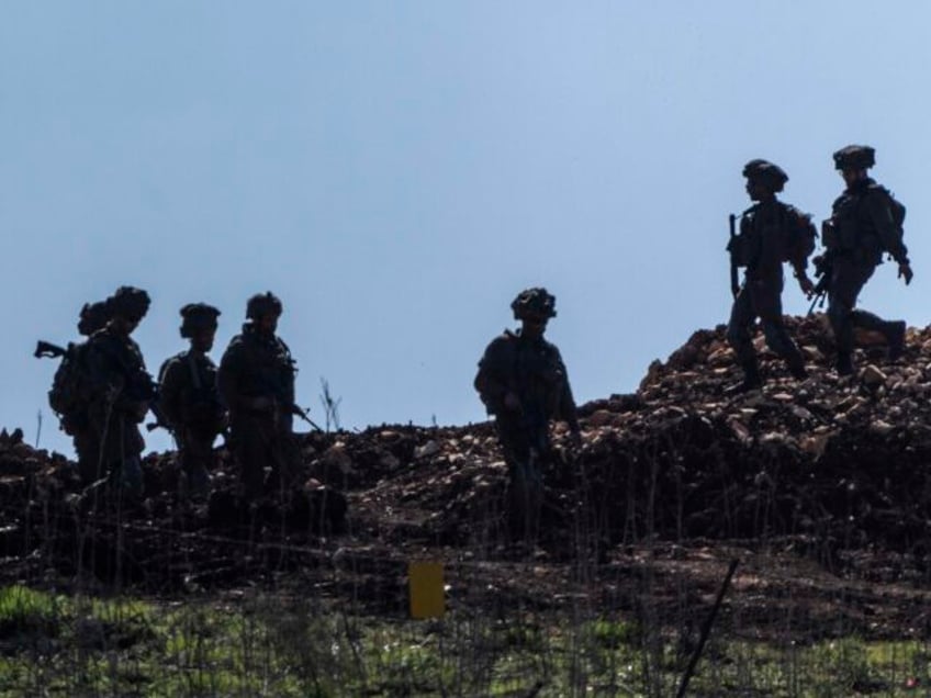 Israeli forces operate in a buffer zone in southern Lebanon as seen from northern Israel,