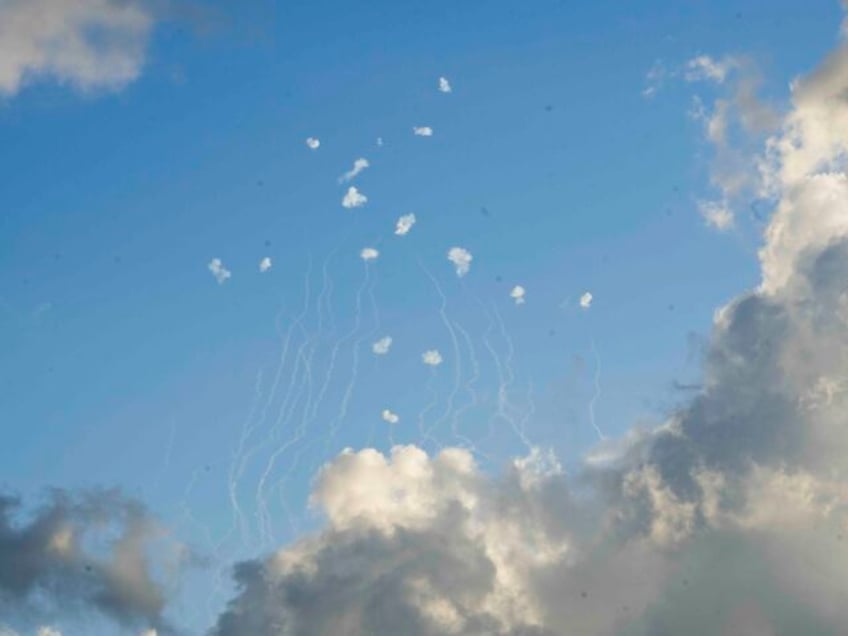 Israeli Iron Dome air defense system fires to intercept rockets that were launched from Le