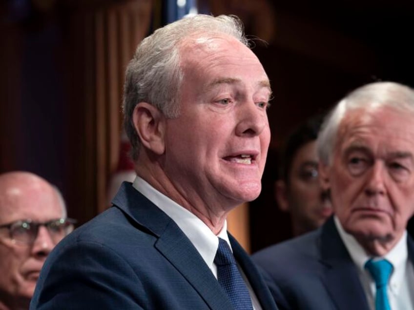 Sen. Chris Van Hollen, D-Md., center, is joined by fellow Democrats as they discuss a nati