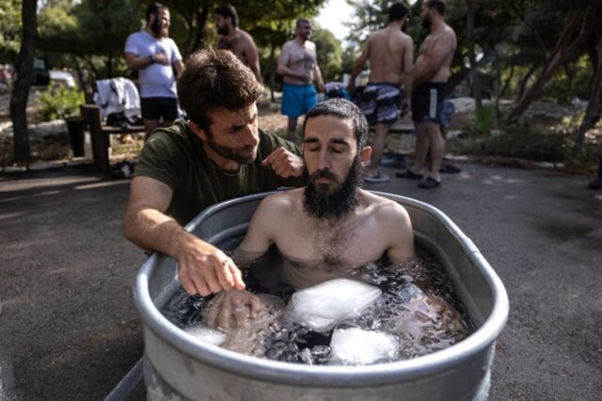 The volunteer Israeli rescue workers, whose role is to collect the remains of the dead, ha