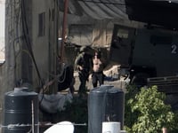 Israel reviewing incident of soldiers tossing bodies off rooftop in West Bank