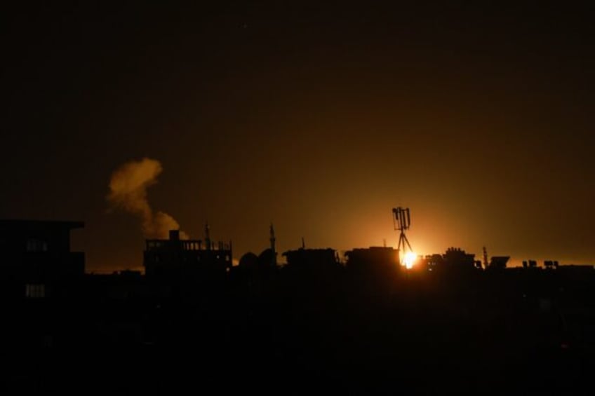 Dozens were reported killed in an overnight Israeli bombardment in the southern Gaza city