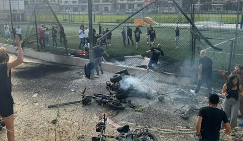 israel says all out war imminent after hezbollah rocket slams into soccer field 30 casualties 