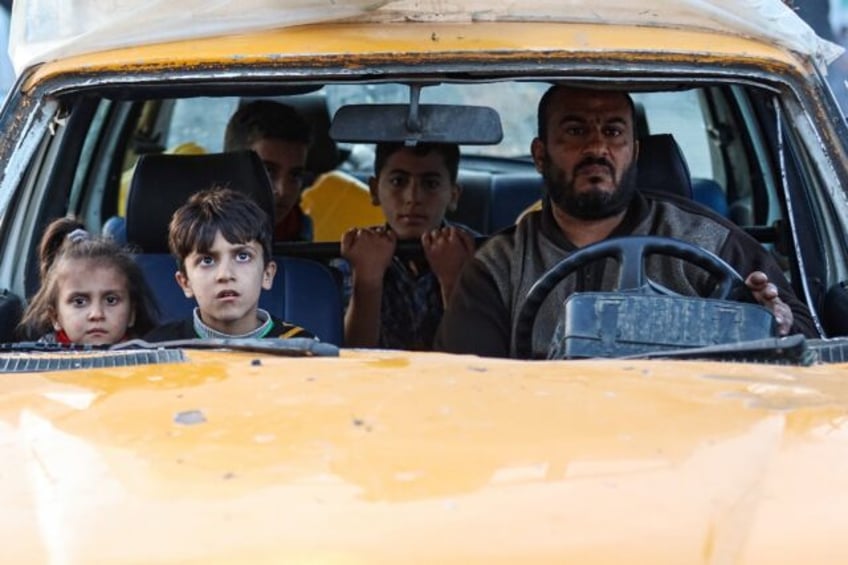 Residents of Bureij refugee camp reach Deir al-Balah city in central Gaza after an army evacuation order