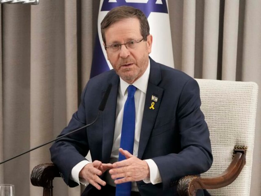 Israel's President Isaac Herzog speaks during his meeting with U.S. Secretary of Stat