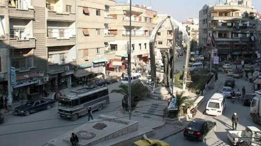 israel threatens military intervention in damascus as internal fighting engulfs suburb