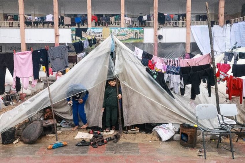 Children camp in a schoolyard in Rafah