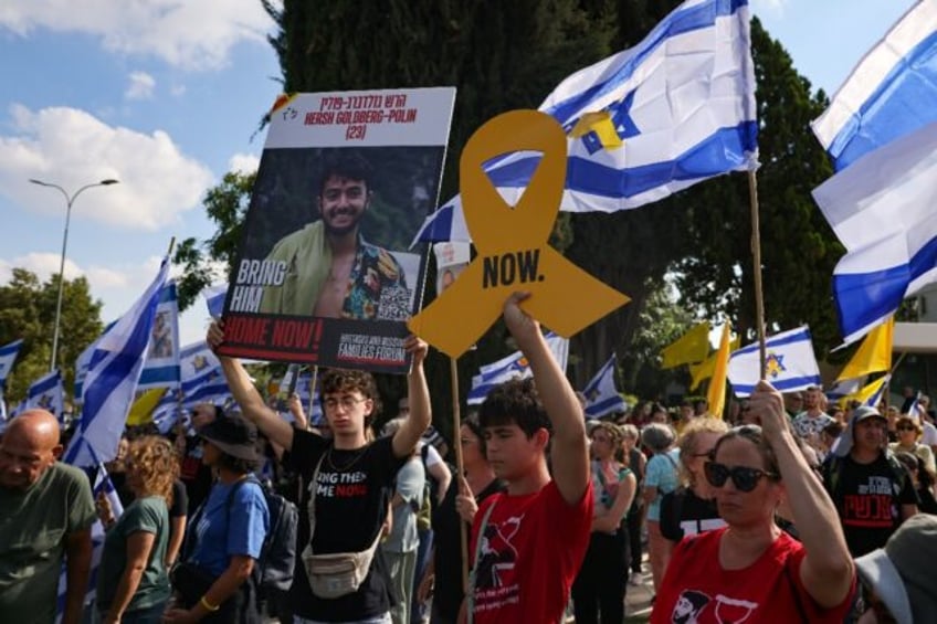 Relatives and supporters of the Israeli hostages protest outside the prime minister's offi