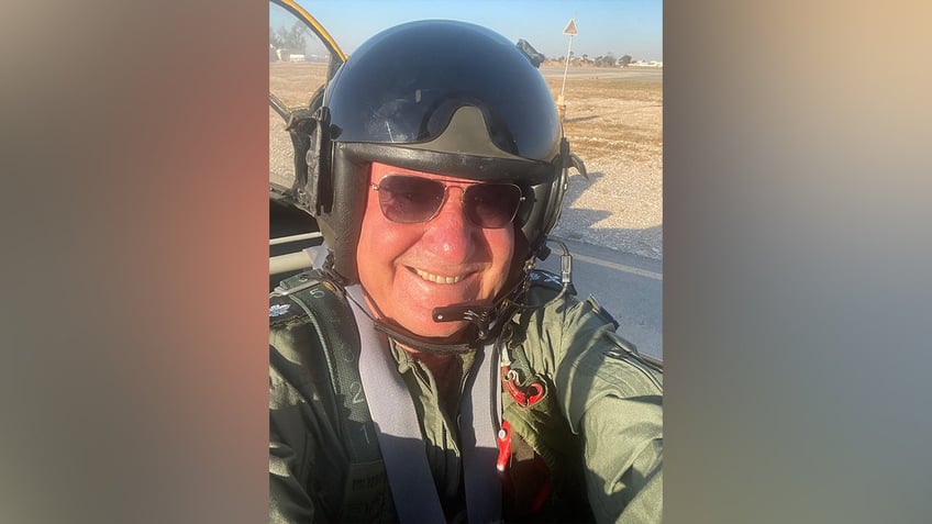 Amos Yadlin in flight suit, helmet