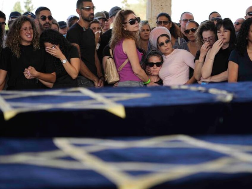 israeli boy 13 buries his entire family murdered in hamas terror attack