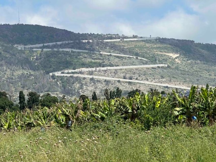 The zigzag border between Israel (left) and Hezbollah (right) appears on a ridge as seen f