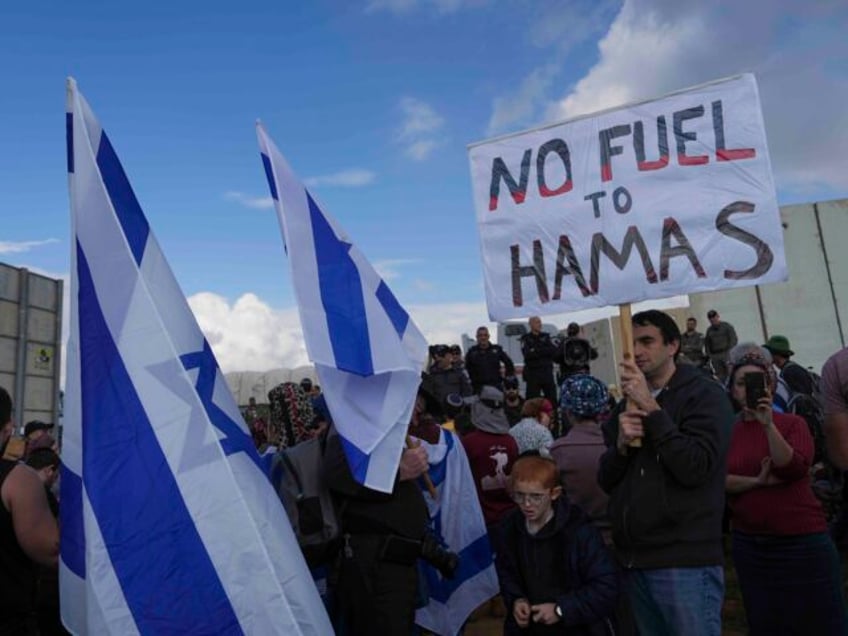 Kerem Shalom hostage protest (Tsafrir Abayov / Associated Press)