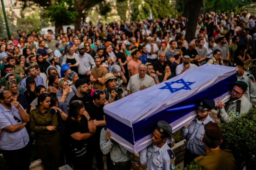 israeli rabbis work around the clock even on the sabbath to count the dead from hamas attack