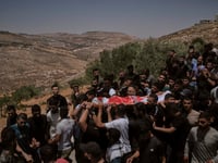Israeli settlers rampage at a military base in the West Bank