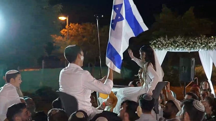 israeli soldier celebrates wedding days after hes shot and his brother goes missing in action