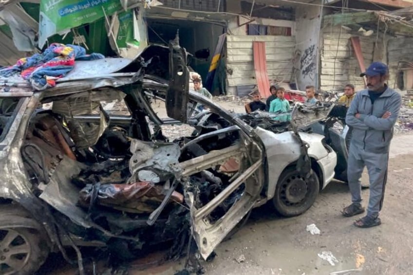 The remains of the car hit by an Israeli strike that Hamas leader Ismail Haniyeh says kill