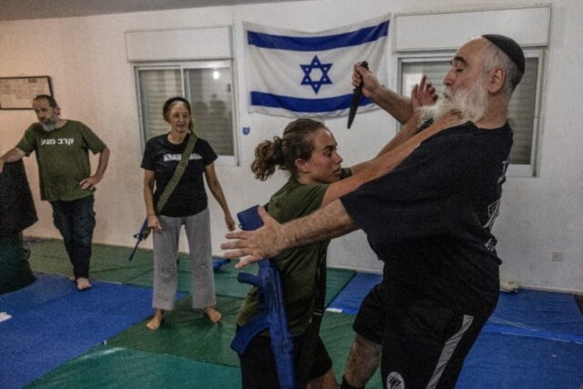 Students in the occupied West Bank train in Krav Maga, an Israeli martial involving an agg