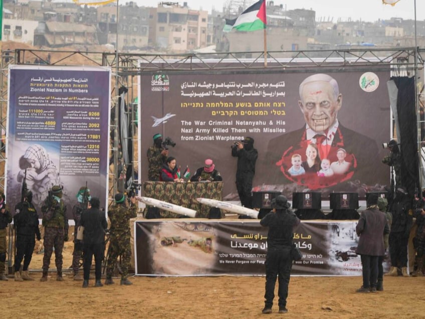 israelis mourn salute dead hostages after hamas stages gruesome handover