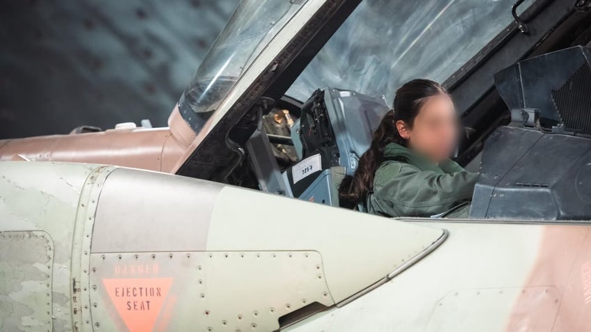 An IDF female pilot in her plane as part of 'Days of Repentance' mission against Iran.