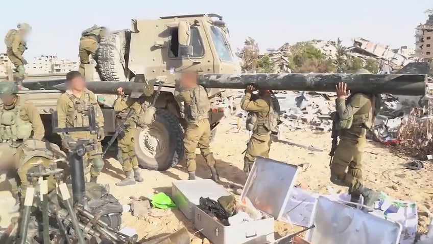 israels military releases video after finding one of hamas largest weapons depots in the gaza strip