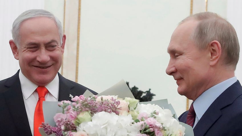 israels netanyahu putin to hold call over hamas war ahead of russian presidents trip to china