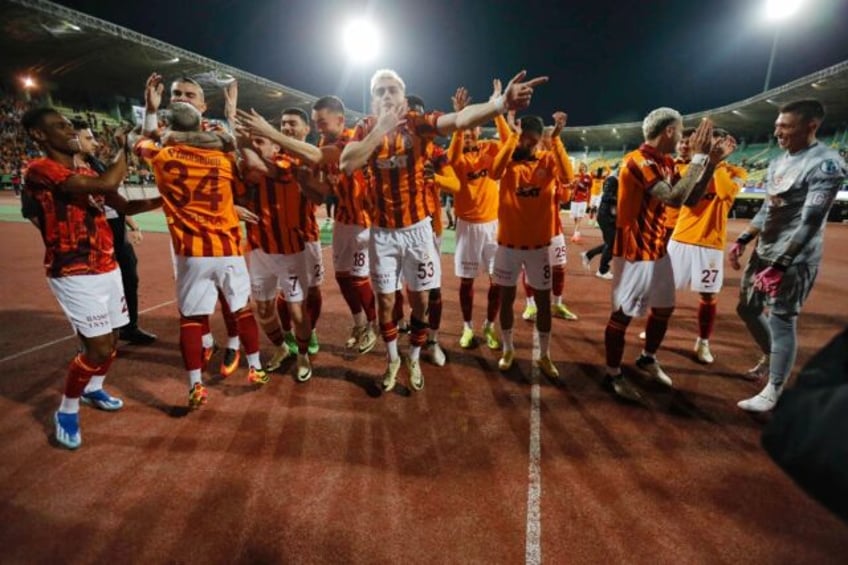 Galatasaray's players celebrating after winning the Turkish Super Cup final after Fenerbah