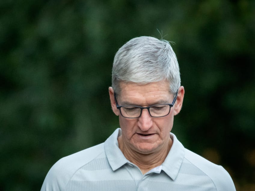 Apple CEO Tim Cook looking down