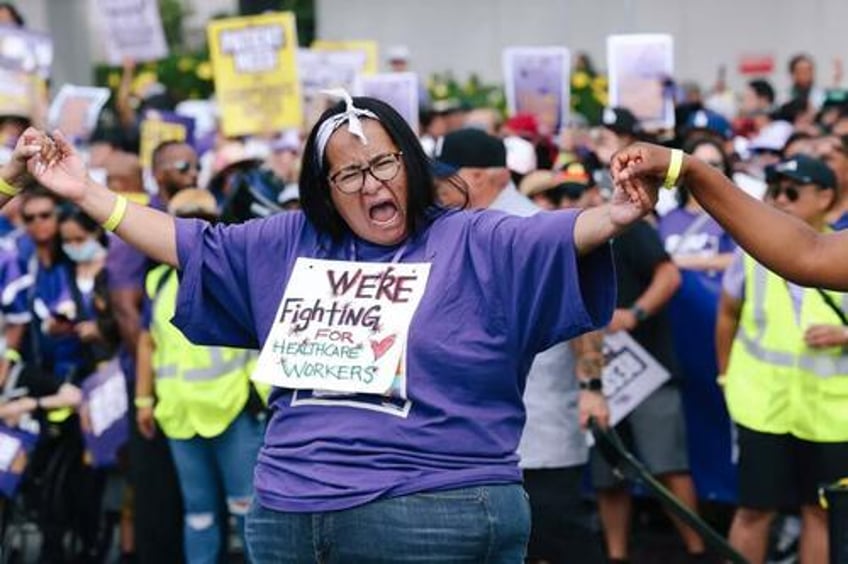 it could be the largest healthcare strike in us history kaiser workers in dc virginia maryland authorize strike