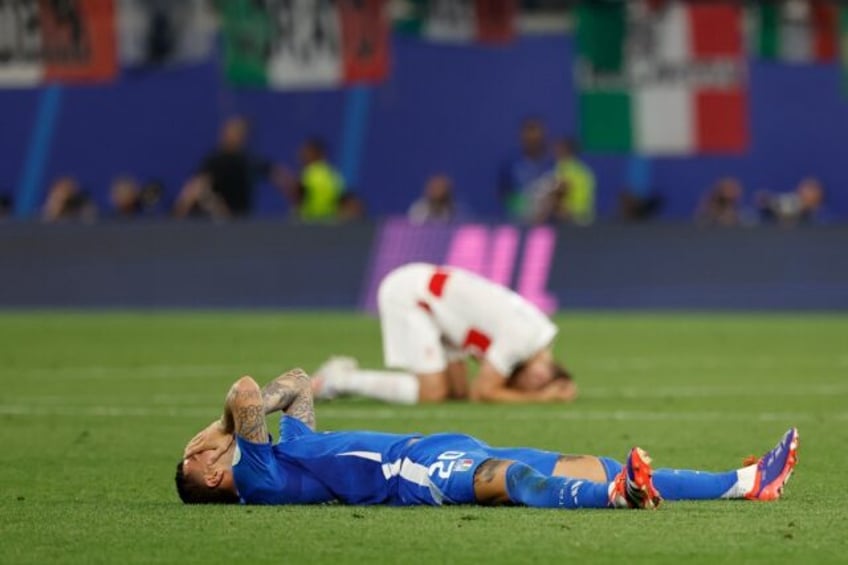 Italy forward Mattia Zaccagni celebrates after securing his team passage to the Euros last