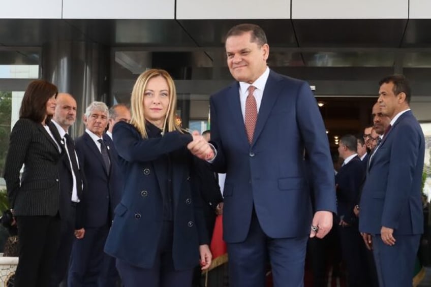 Italy's Giorgia Meloni being welcomed by interim Prime Minister Abdulhamid Dbeibah