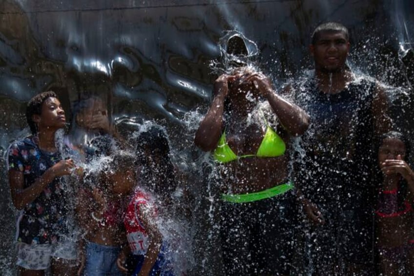 its not yet summer in brazil but a dangerous heat wave is sweeping the country