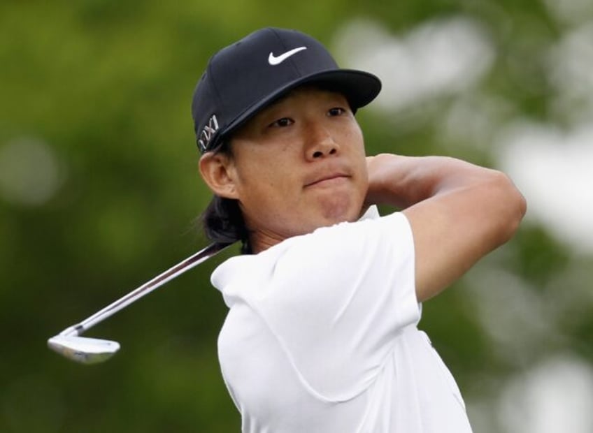 Anthony Kim watches his tee shot on the ninth hole at the Shell Houston Open at Redstone G