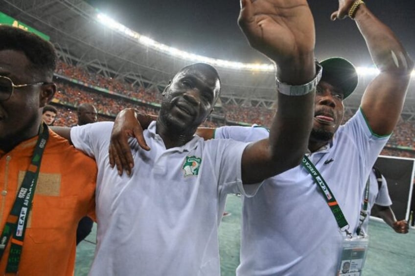 Ivory Coast coach Emerse Fae (C) celebrates after his team beat Nigeria in Sunday's Africa