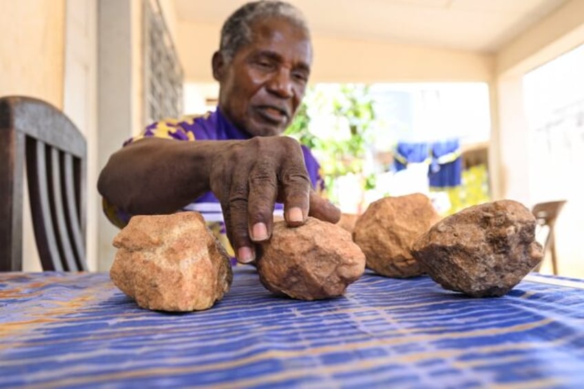 Archaeologist Francois Guede Yiode keeps the prehistoric stones in his home