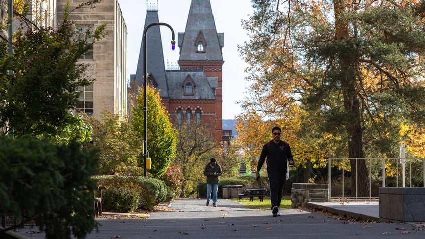 People walk through the Cornell University campus on November 3, 2023 in Ithaca, New York.