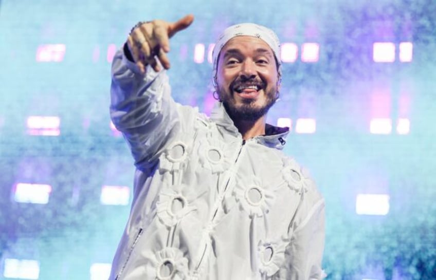 j balvin returns to his reggaeton roots on the romantic amigos and no it is not about bad bunny