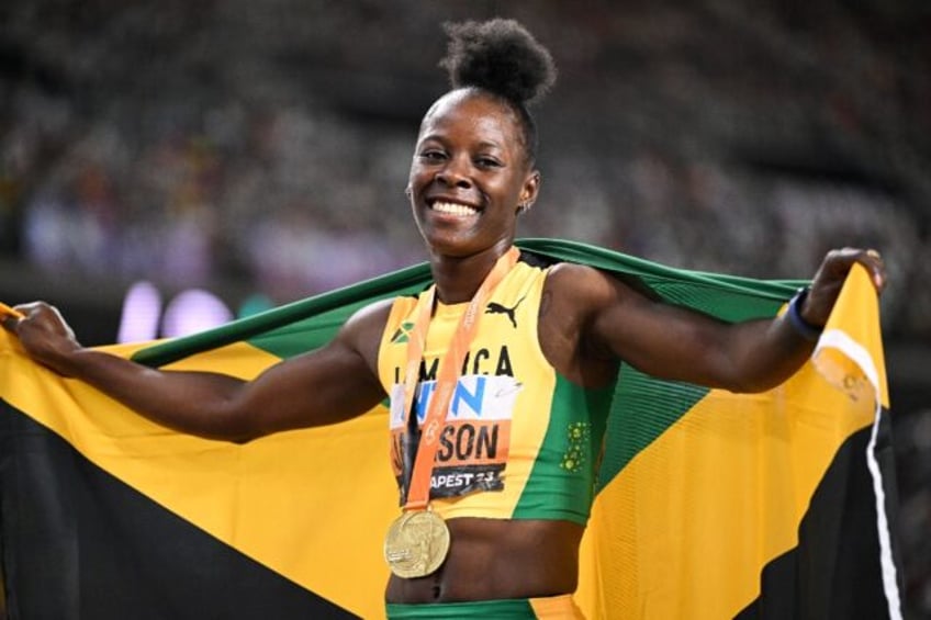 jackson retains womens 200m world title with stunning run