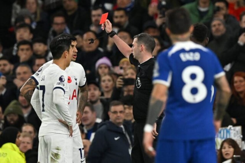 jackson treble fires chelsea to chaotic victory over nine man spurs