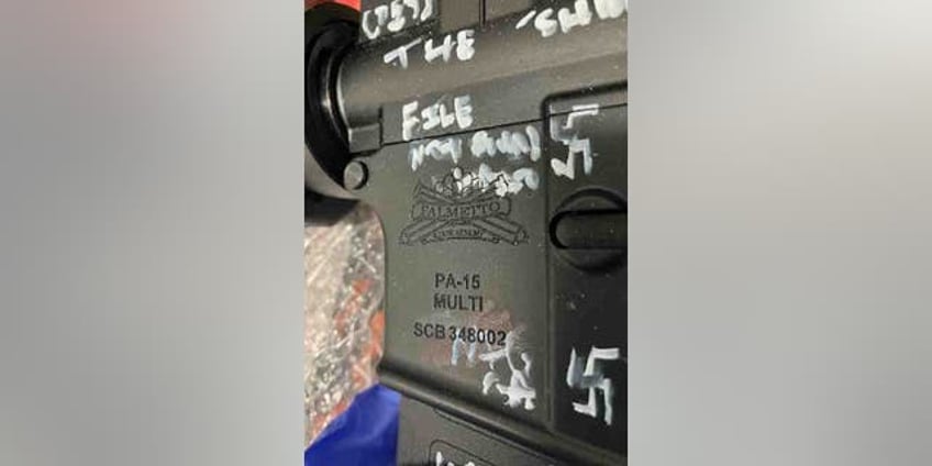 jacksonville sheriff releases images of weapon bearing swastikas after dollar general shooting