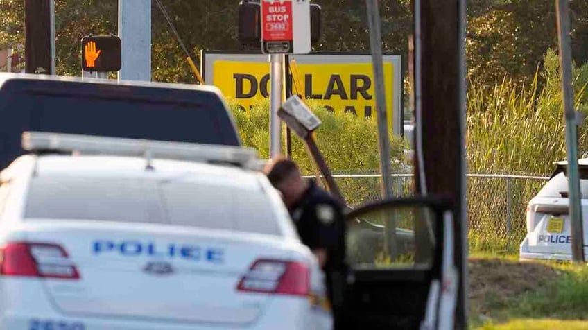 jacksonville sheriff releases images of weapon bearing swastikas after dollar general shooting