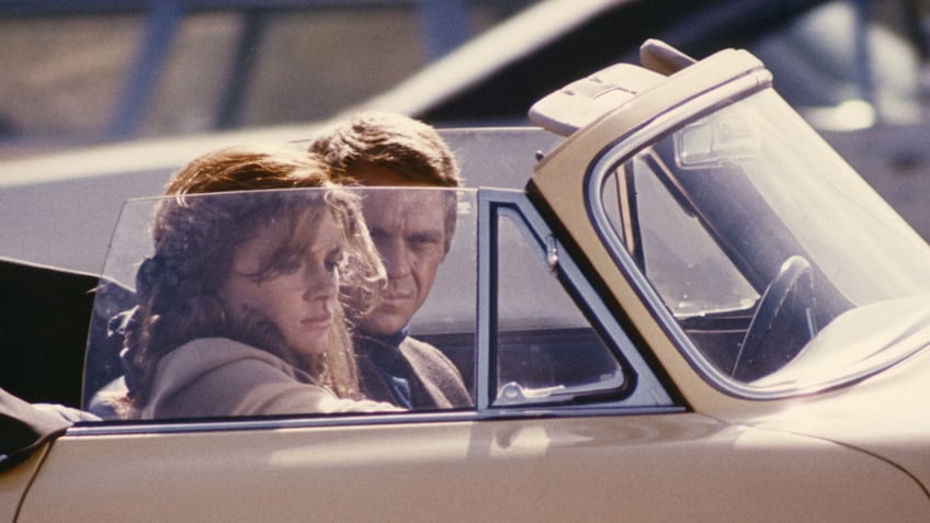 Jacqueline Bisset being driven by Steve McQueen