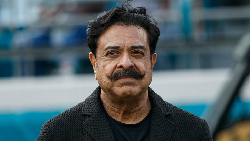 Shad Khan on the field