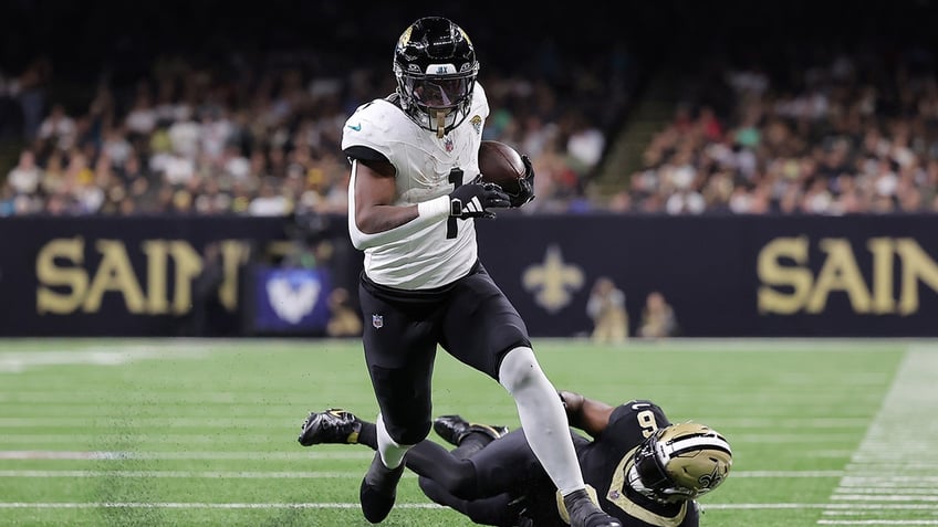 jaguars salvage win against saints after critical touchdown drop by new orleans in final seconds