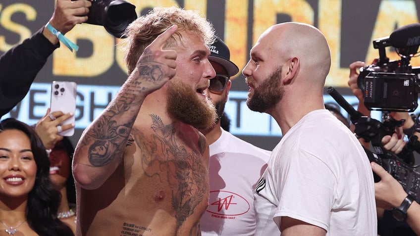 Jake Paul and Ryan Bourland at weigh in