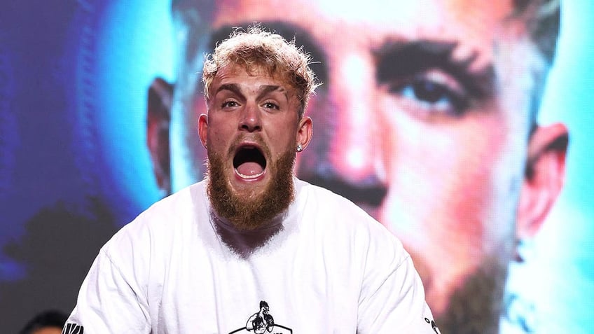 jake paul and his opponents fans exchange explicit chants at weigh in