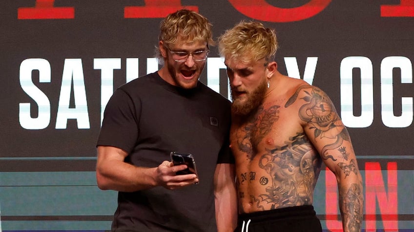 jake paul dismisses conspiracy that he and brother logan are planning fight after brief skirmish