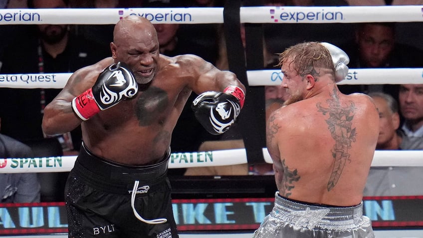 Mike Tyson swings at Jake Paul