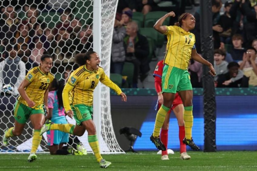 jamaica claim first world cup win to close on last 16