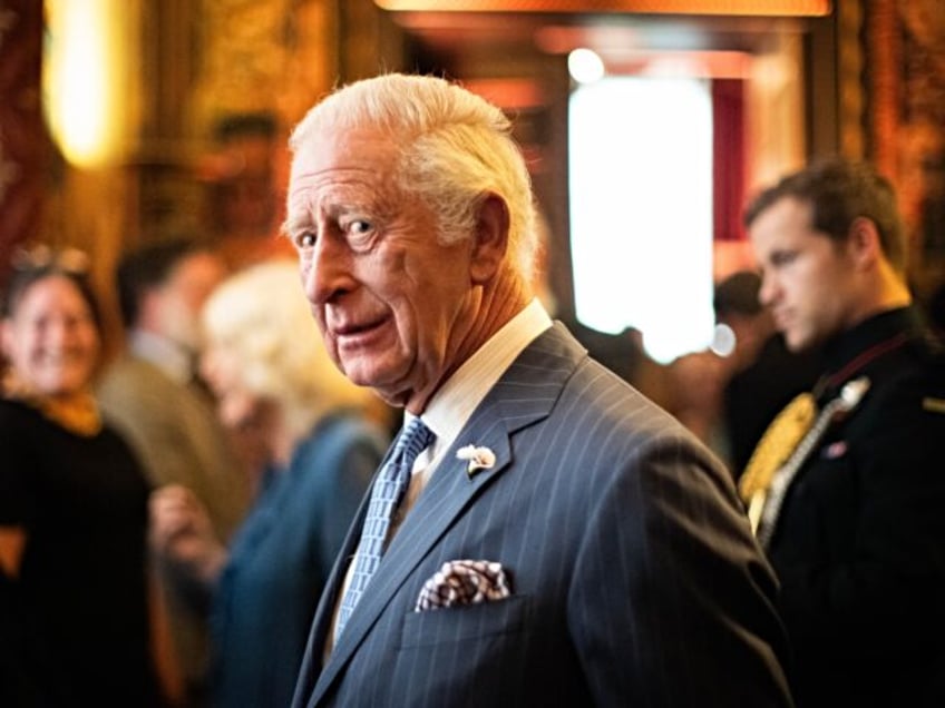 LONDON, ENGLAND - JUNE 24: King Charles III reacts during a reception to celebrate 25 year